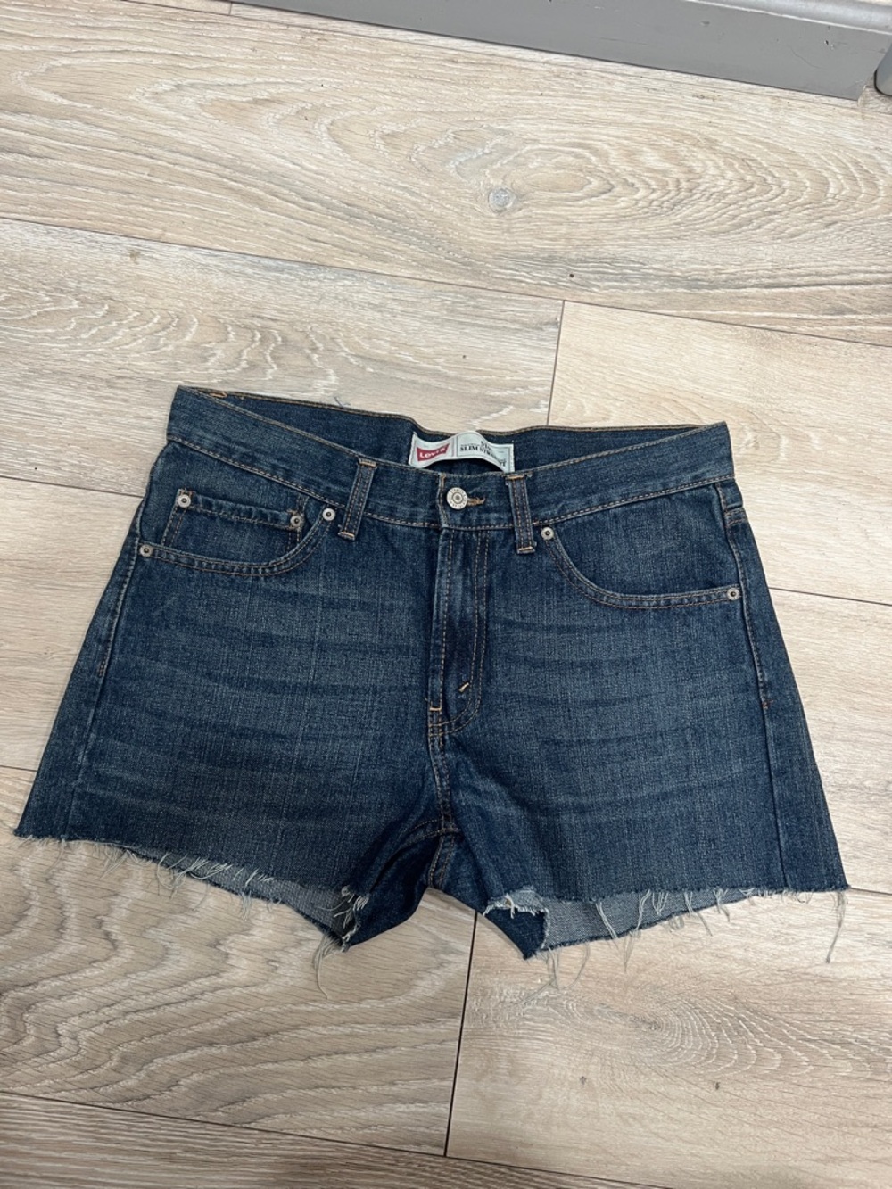Levi's Dark Blue Denim Cutoff Shorts with Frayed Hem